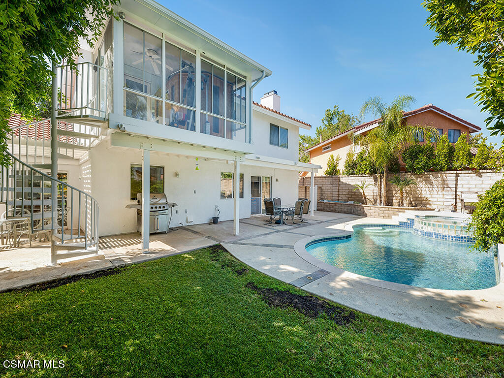 5218 Indian Hills Drive Simi Valley, CA 93063 - Photo 6 of 44 a view of a house with swimming pool and sitting area