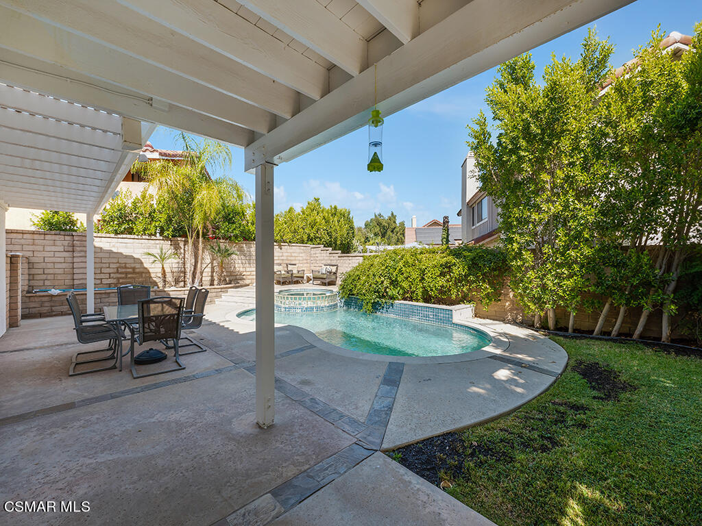 5218 Indian Hills Drive Simi Valley, CA 93063 - Photo 7 of 44 a view of a porch with chairs and backyard