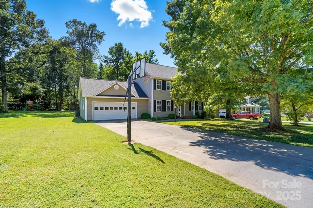 a house view with a garden space