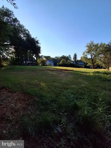 a view of a golf course with a lake