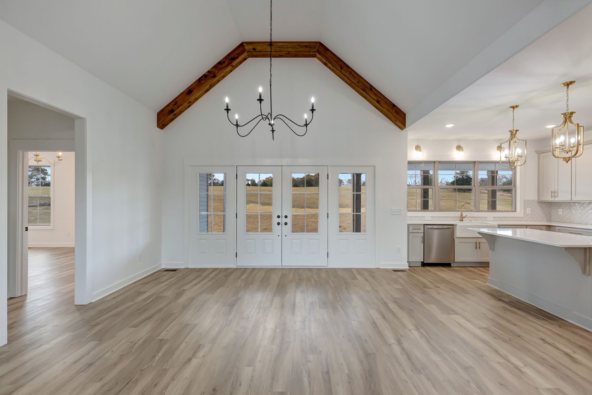 1 Hunter Bills Road Lewisburg, TN 37091 - Photo 15 of 48 a view of an empty room with a kitchen and a kitchen view
