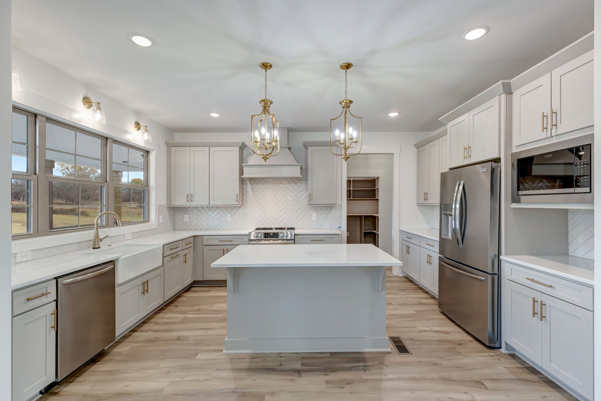 1 Hunter Bills Road Lewisburg, TN 37091 - Photo 16 of 48 a large kitchen with stainless steel appliances kitchen island granite countertop a large counter top a sink stainless steel appliances and cabinets