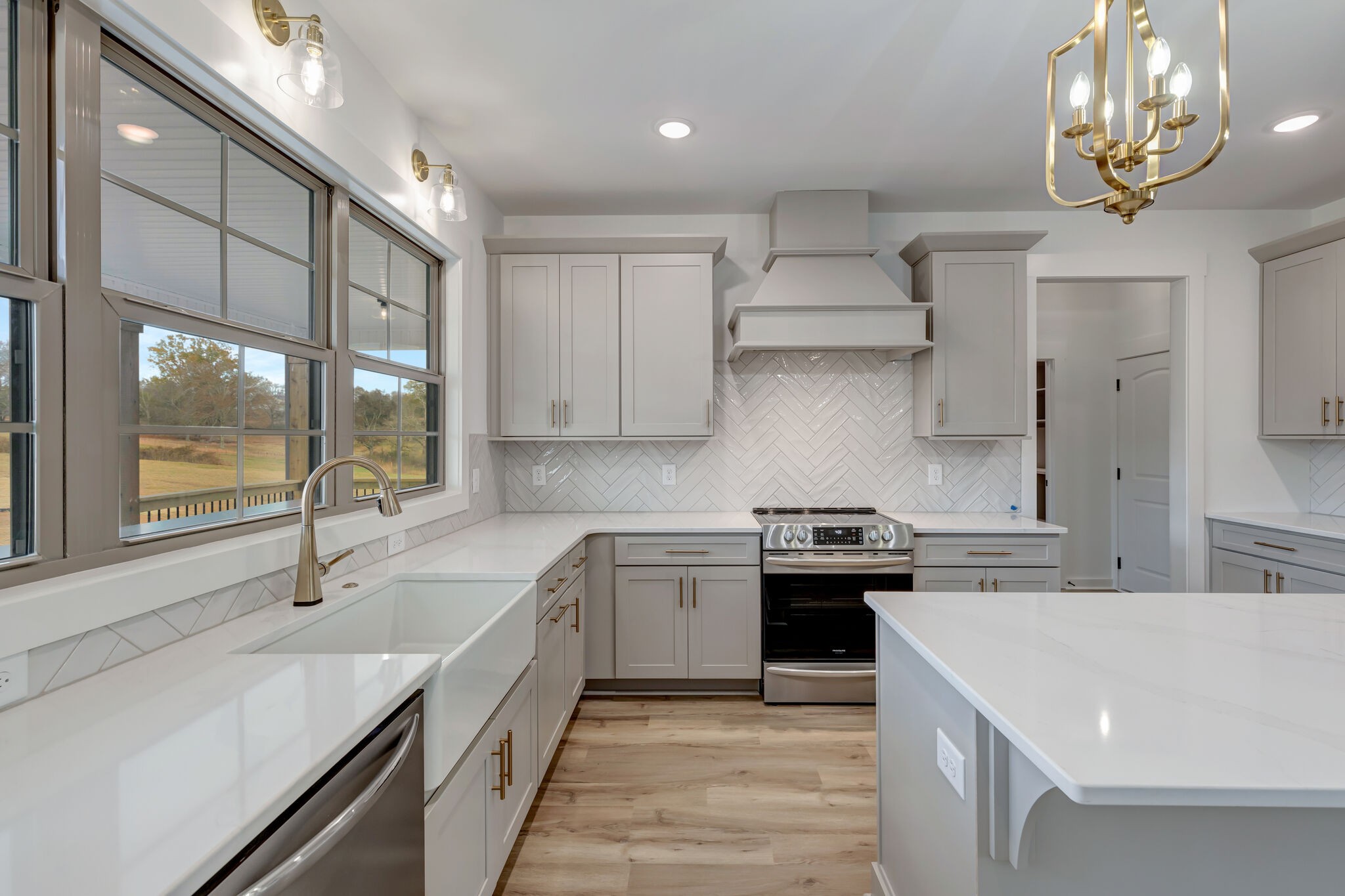 1 Hunter Bills Road Lewisburg, TN 37091 - Photo 20 of 48 a kitchen with a sink a stove and cabinets