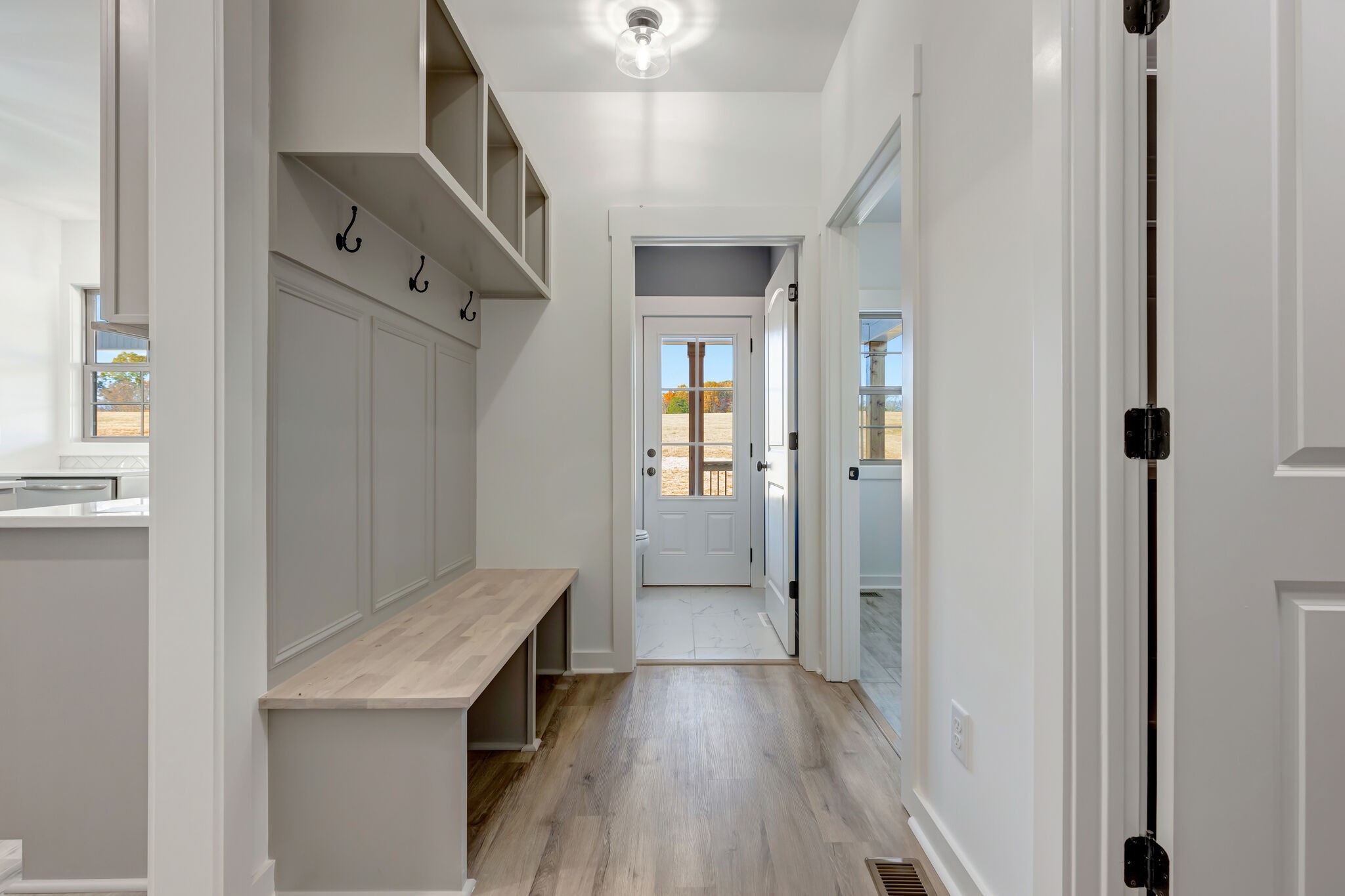 1 Hunter Bills Road Lewisburg, TN 37091 - Photo 22 of 48 a view of a hallway with wooden floor and staircase