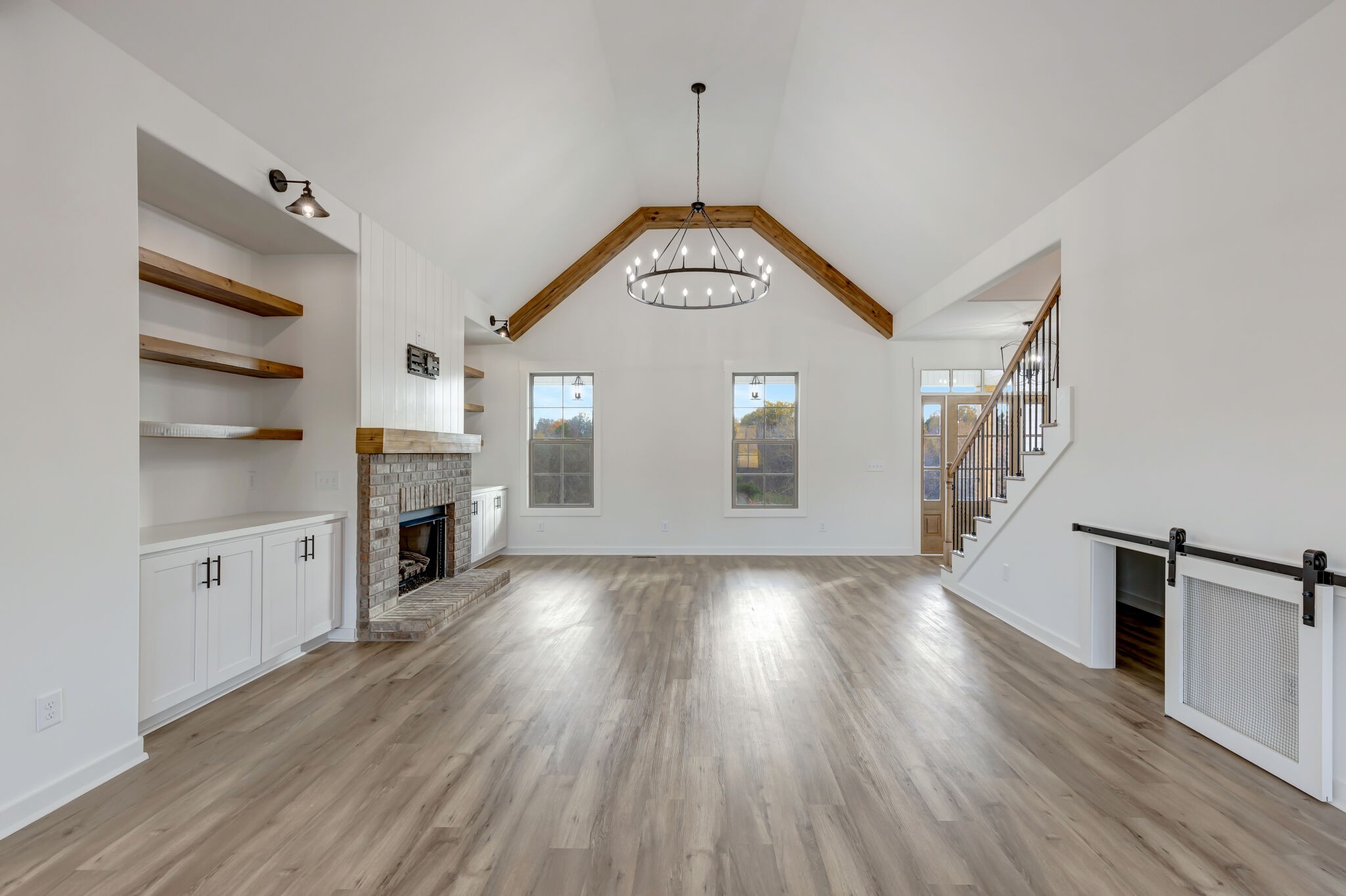 1 Hunter Bills Road Lewisburg, TN 37091 - Photo 10 of 48 wooden floor in an empty room with a fireplace