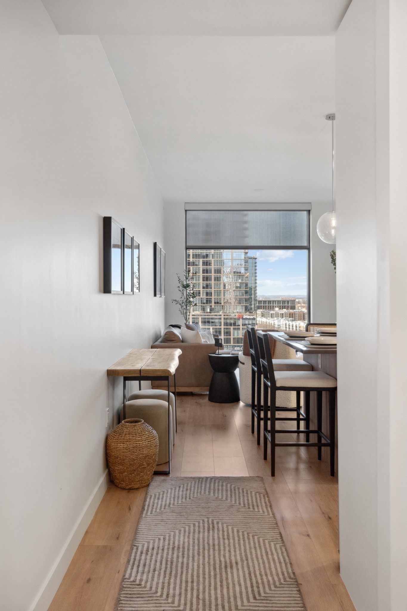 1212 Demonbreun Street, Unit A3(A) Nashville, TN 37203 - Photo 2 of 26 a view of a dining room with furniture and window