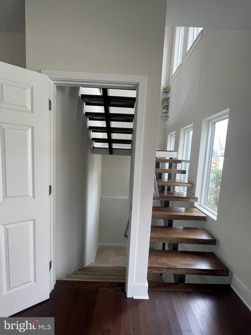 8618 Jones Mill Road Chevy Chase, MD 20815 - Photo 25 of 59 a view of entryway with stairs and wooden floor
