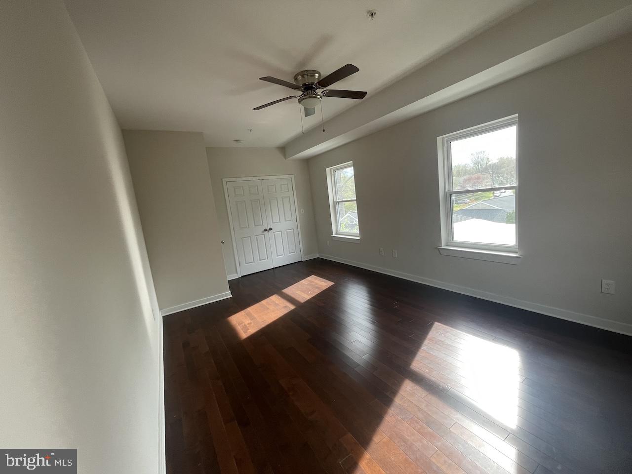 8618 Jones Mill Road Chevy Chase, MD 20815 - Photo 37 of 59 a view of a livingroom with a ceiling fan and window