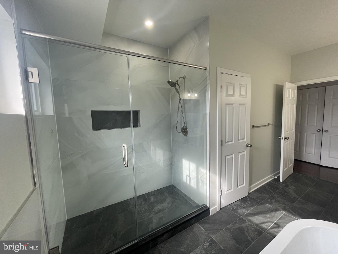 8618 Jones Mill Road Chevy Chase, MD 20815 - Photo 45 of 59 a bathroom with a shower