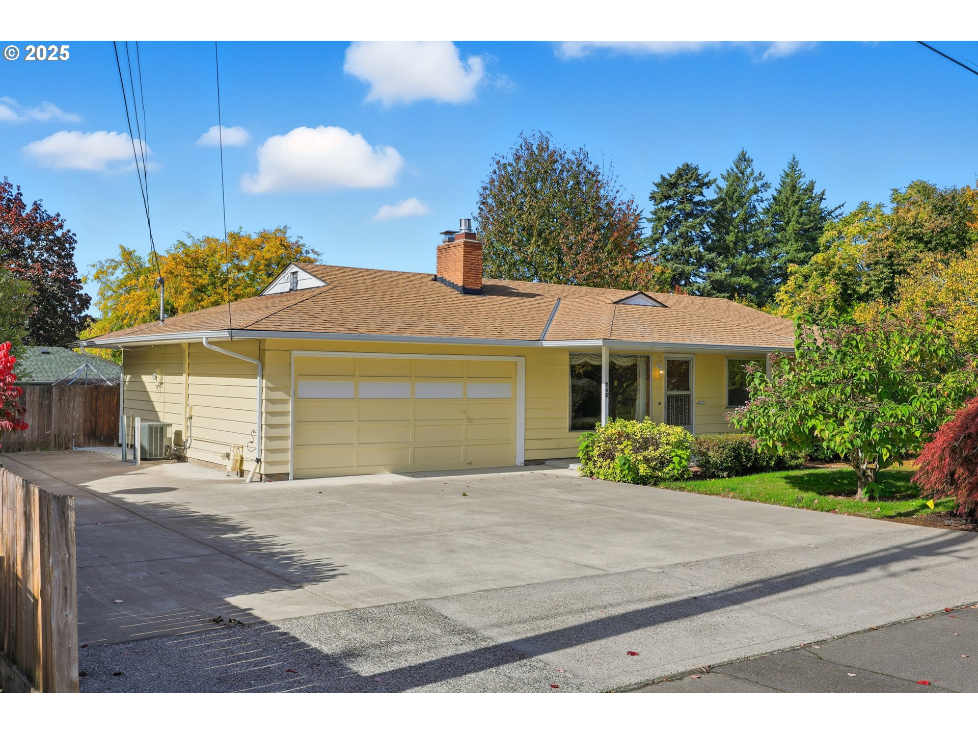 a view of a house with a yard
