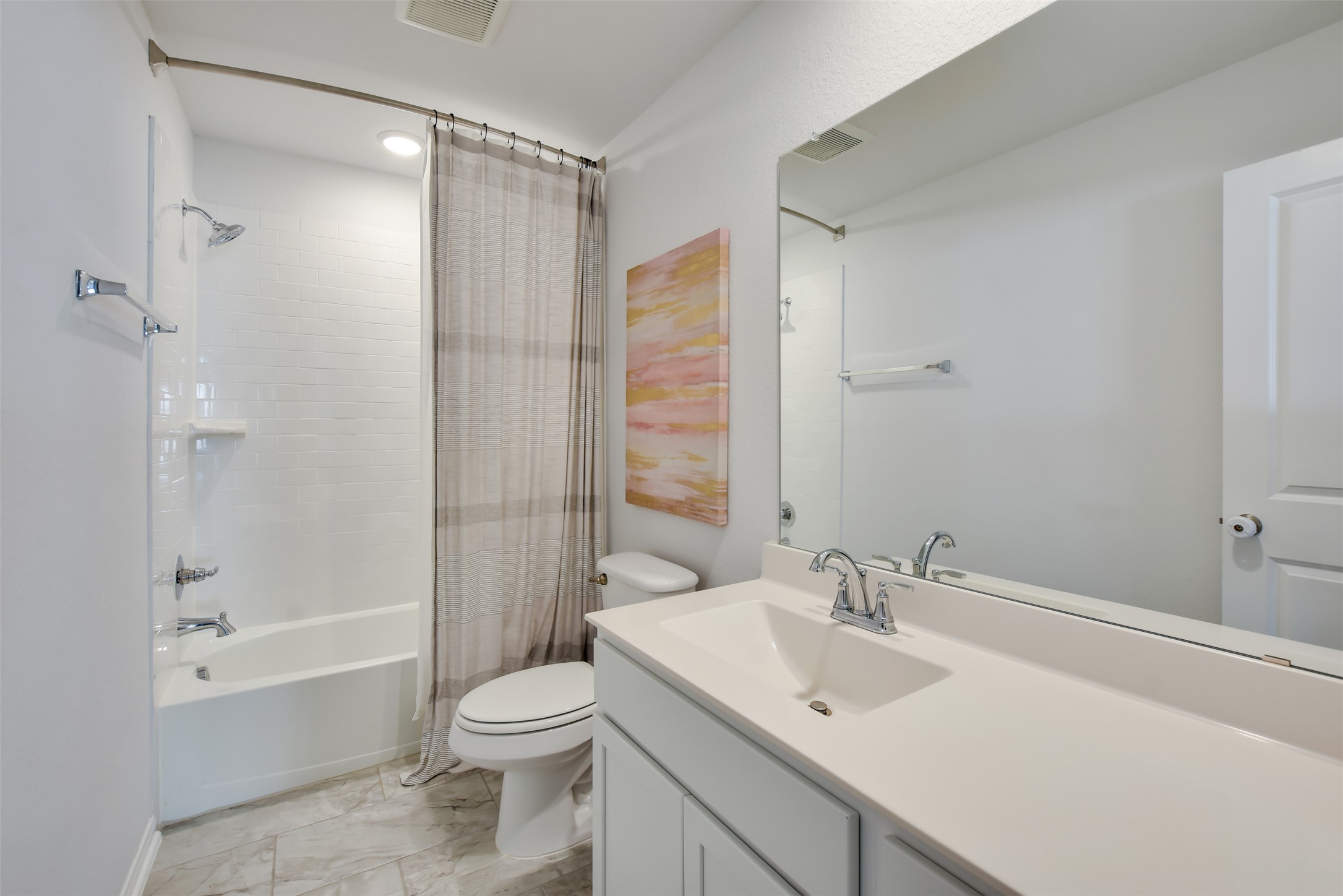 605 Oleander Loop Buda, TX 78610 - Photo 26 of 32 a bathroom with a sink toilet and shower