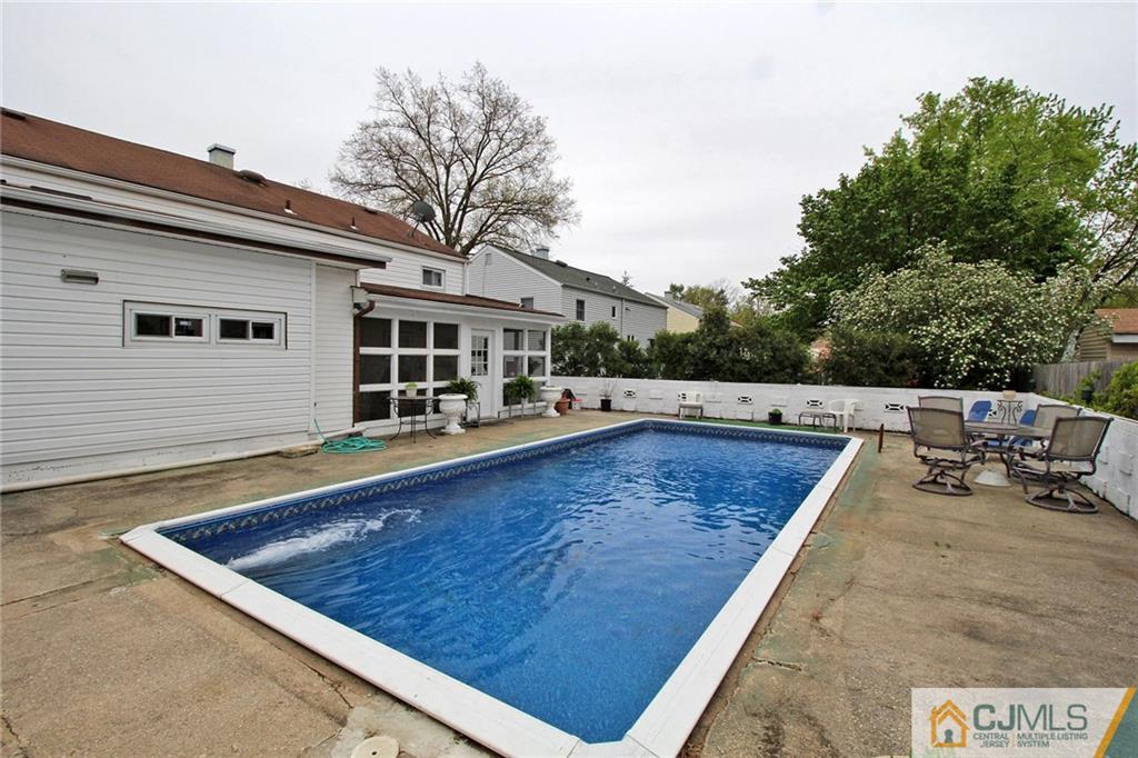 193 McFarlane Road Colonia, NJ 07067 - Photo 16 of 25 swimming pool view with a outdoor seating