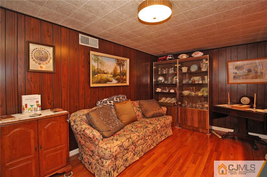 193 McFarlane Road Colonia, NJ 07067 - Photo 18 of 25 a living room with furniture
