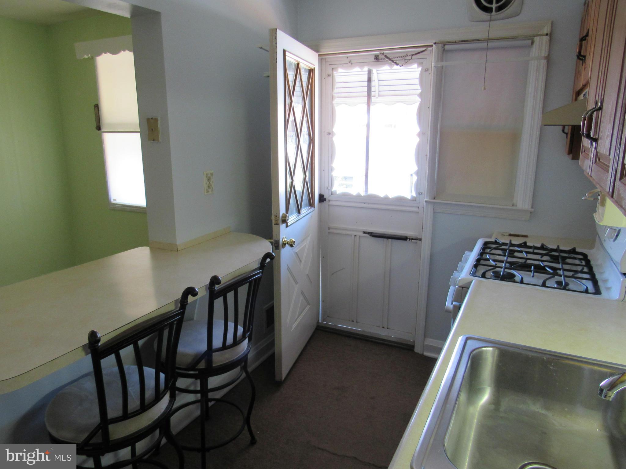 1912 Haselmere Road Baltimore, MD 21222 - Photo 14 of 29 a view of a room with windows