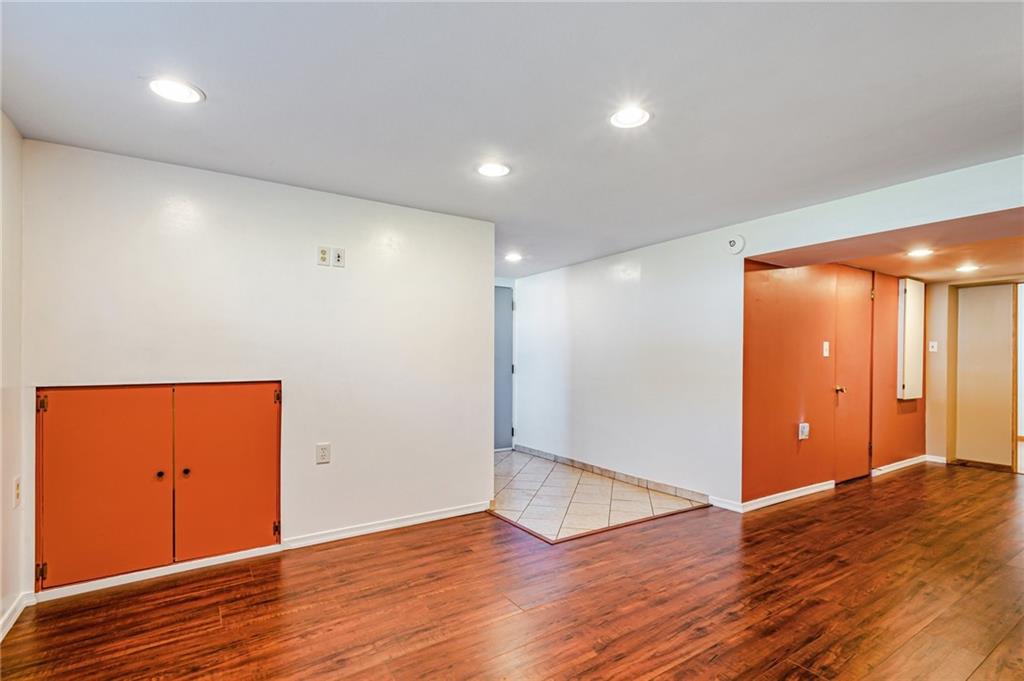 5000 Homeville Road West Mifflin, PA 15122 - Photo 18 of 24 a view of an empty room with wooden floor and closet