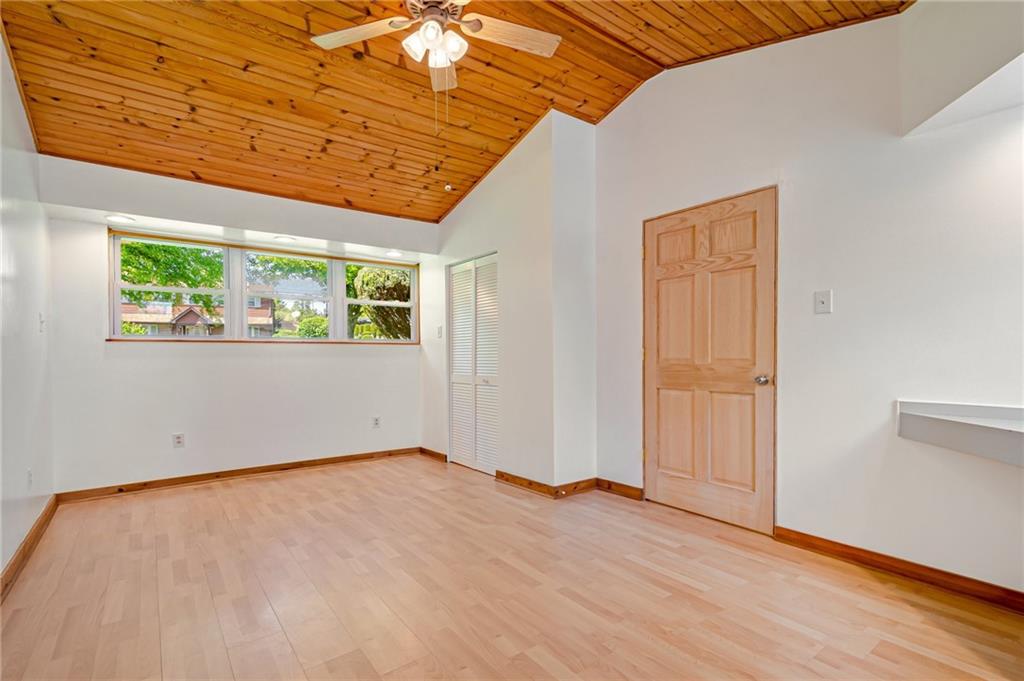 5000 Homeville Road West Mifflin, PA 15122 - Photo 20 of 24 a view of empty room with wooden floor and fan
