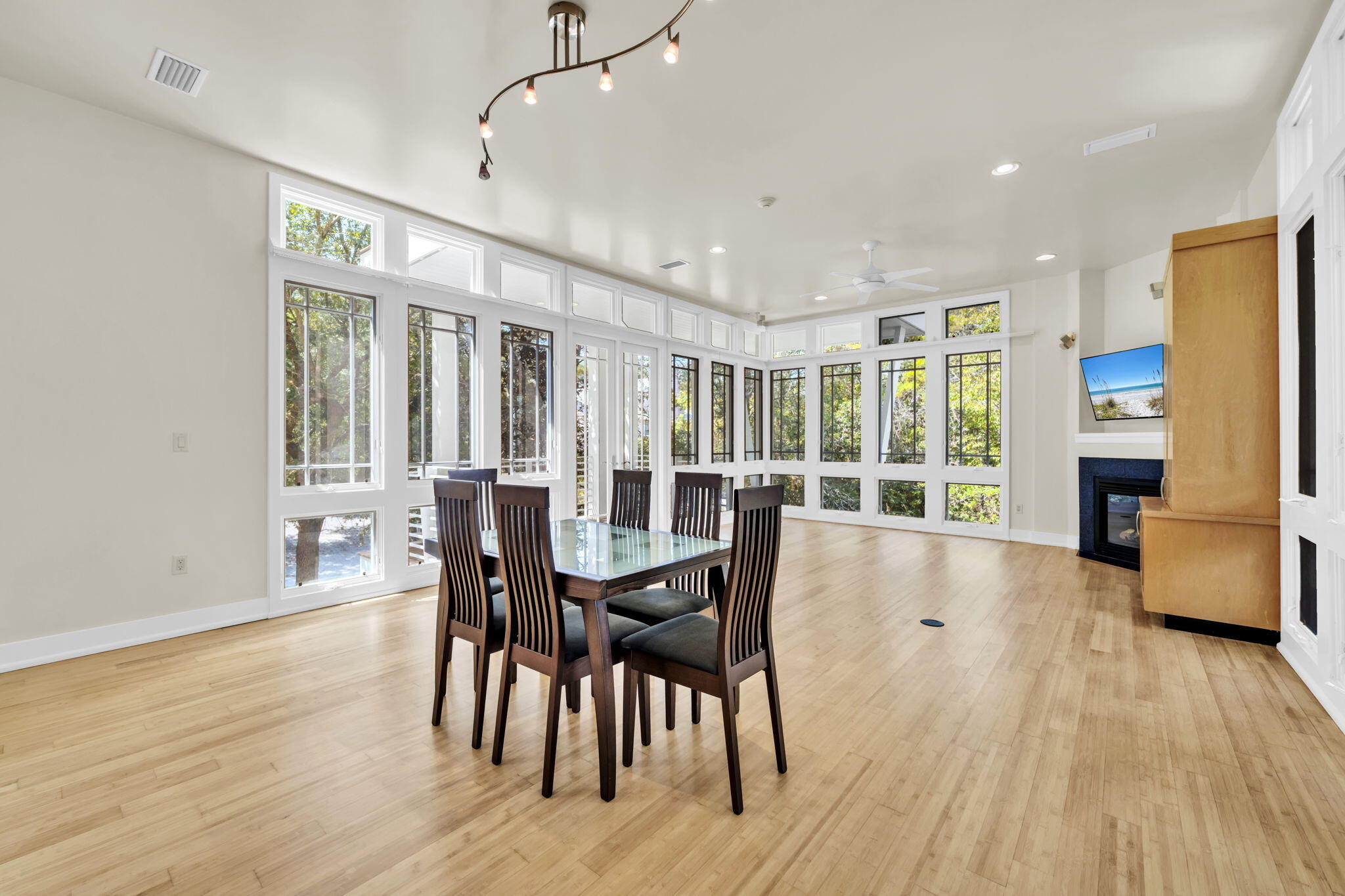 286 Forest Street Santa Rosa Beach, FL 32459 - Photo 11 of 68 a view of a dining room with furniture window and wooden floor