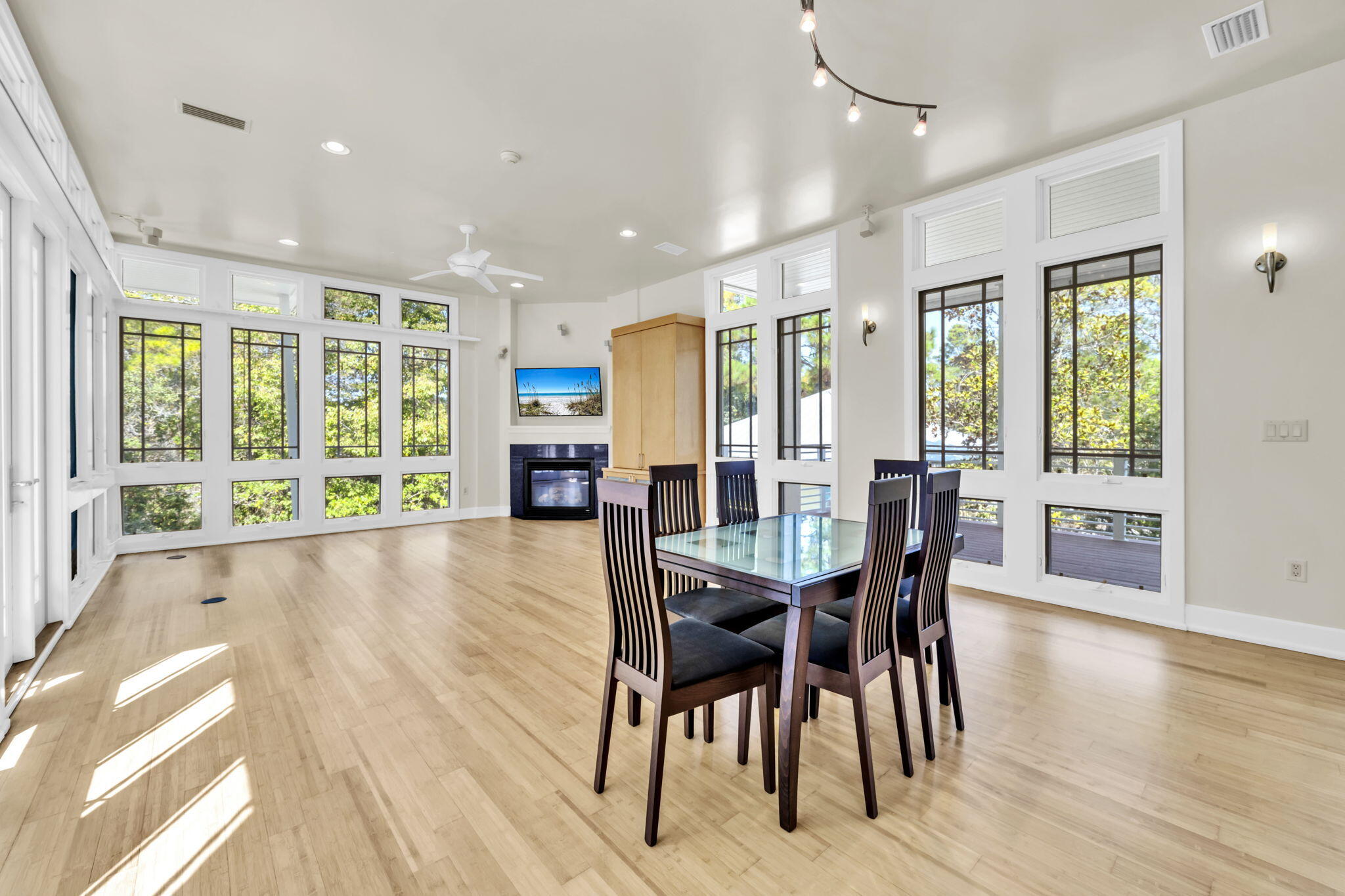 286 Forest Street Santa Rosa Beach, FL 32459 - Photo 12 of 68 a view of a dining room with furniture window and wooden floor