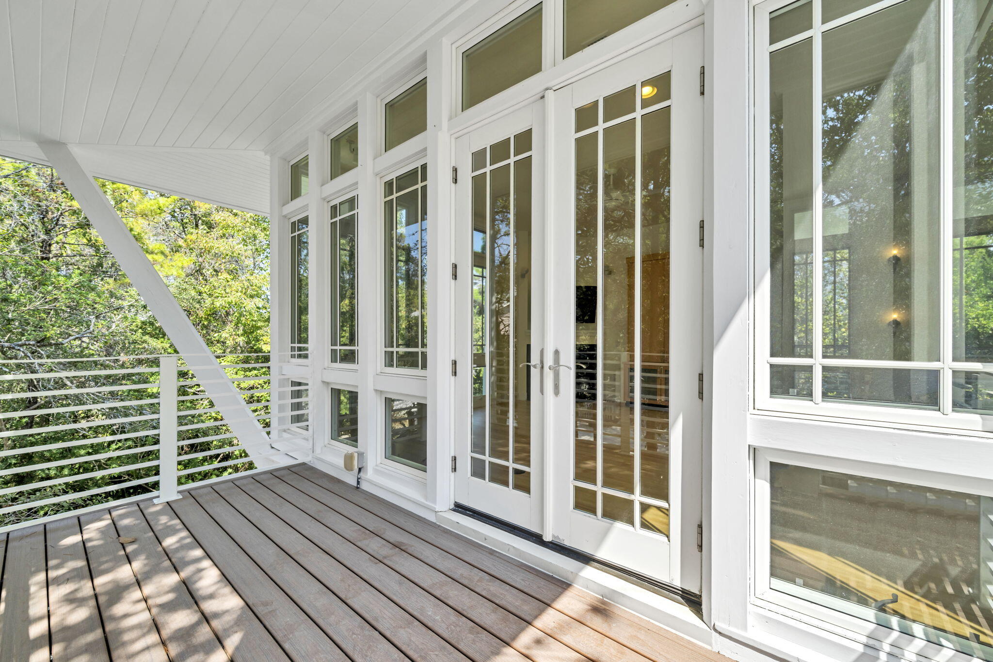 286 Forest Street Santa Rosa Beach, FL 32459 - Photo 15 of 68 a view of a balcony with wooden floor