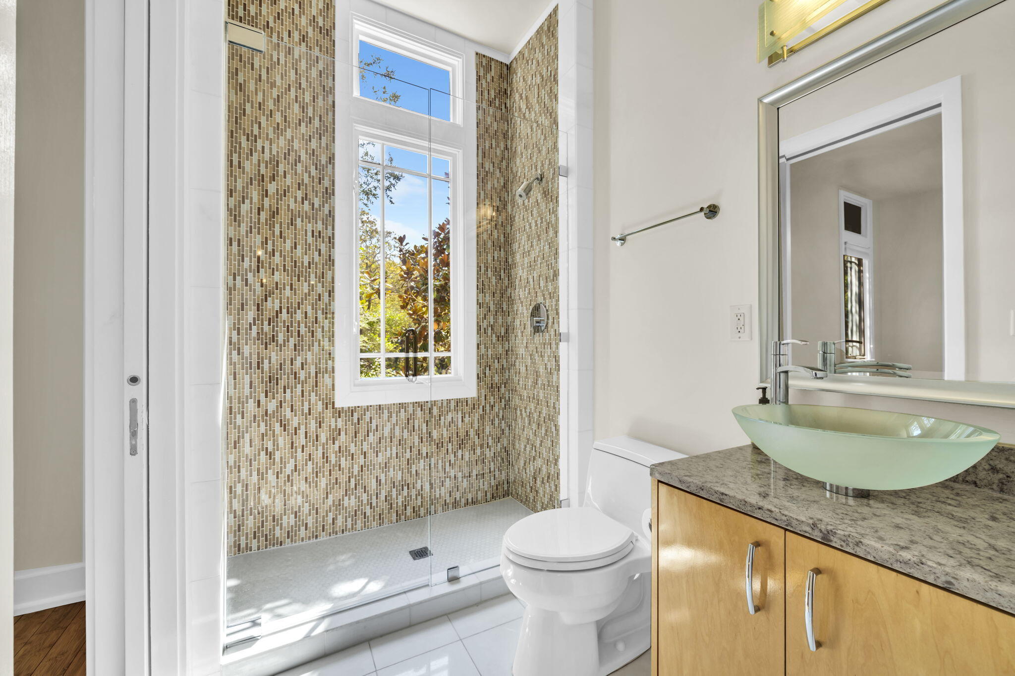 286 Forest Street Santa Rosa Beach, FL 32459 - Photo 18 of 68 a bathroom with a granite countertop sink a toilet and shower