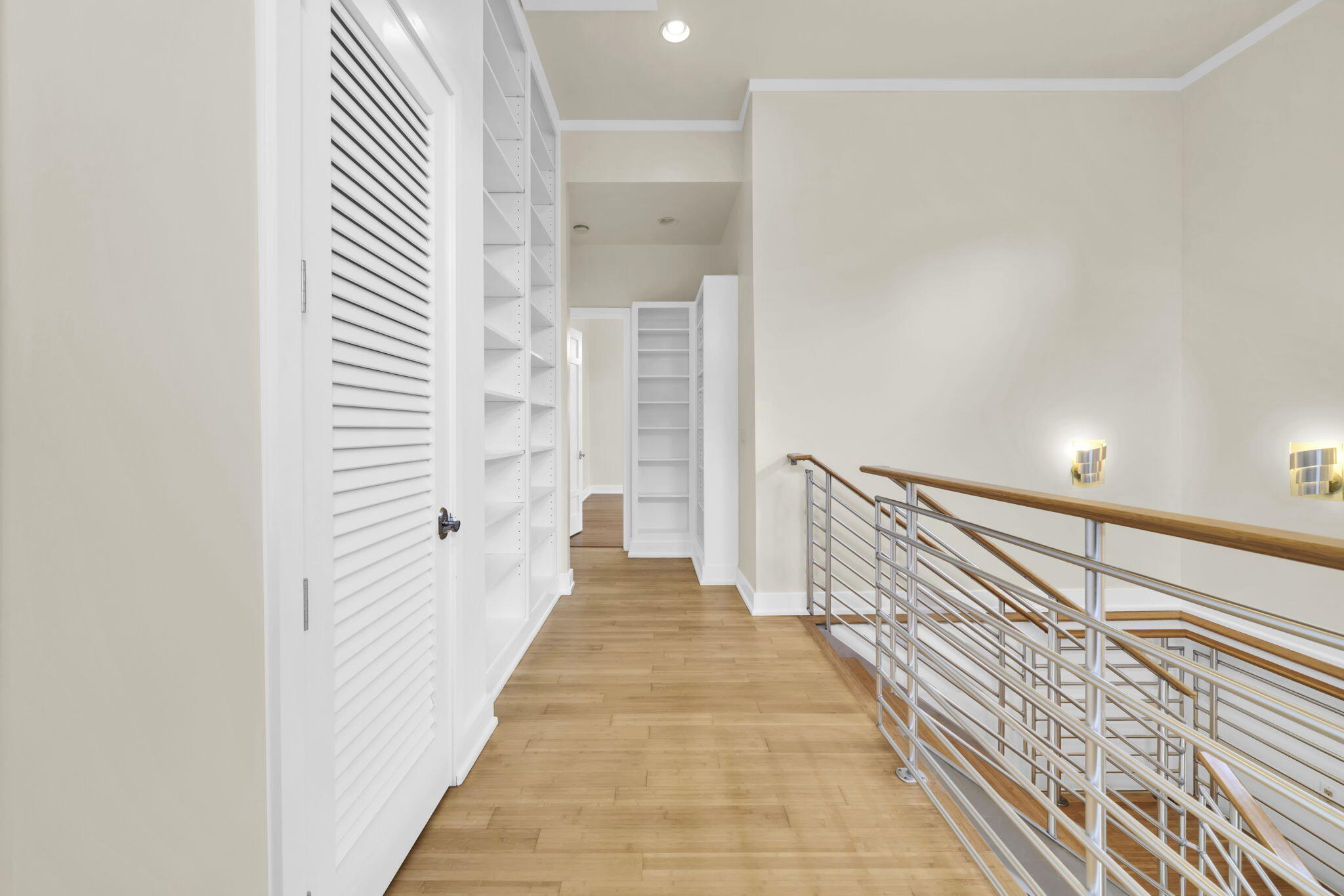 286 Forest Street Santa Rosa Beach, FL 32459 - Photo 21 of 68 a view of a hallway with wooden floor and staircase