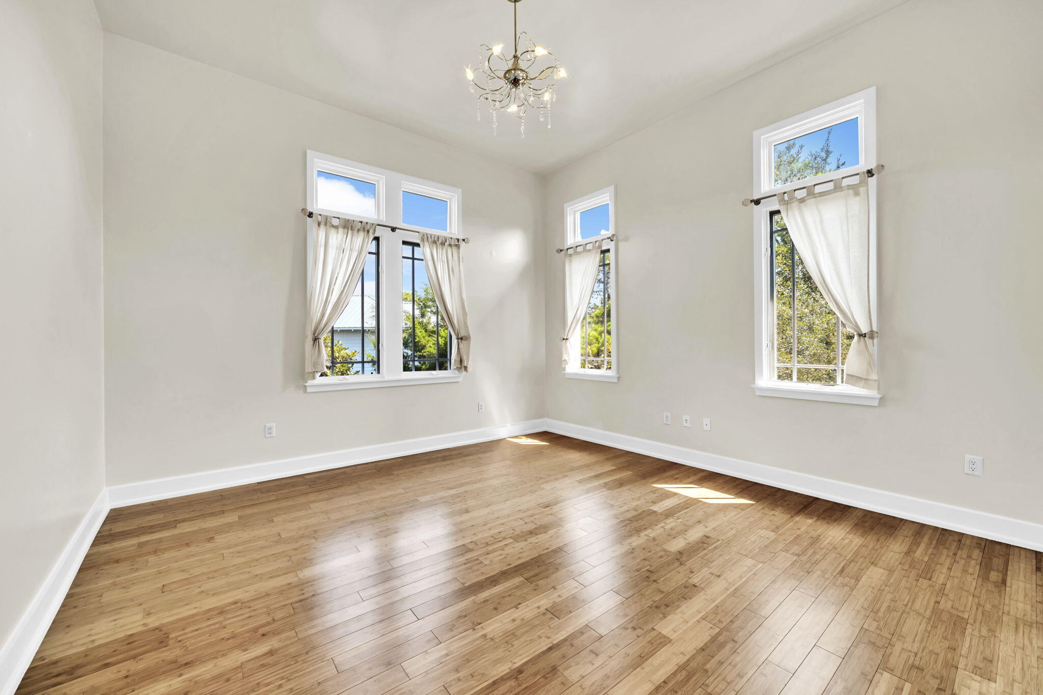 286 Forest Street Santa Rosa Beach, FL 32459 - Photo 22 of 68 wooden floor in an empty room with a window
