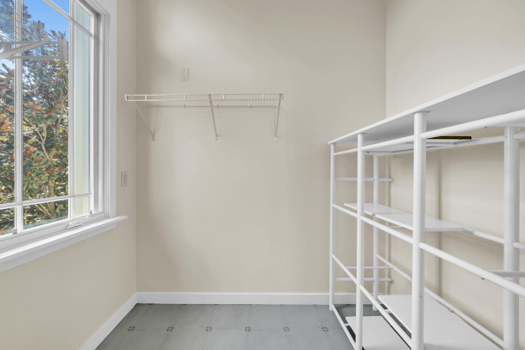 286 Forest Street Santa Rosa Beach, FL 32459 - Photo 23 of 68 a view of an empty room with a window