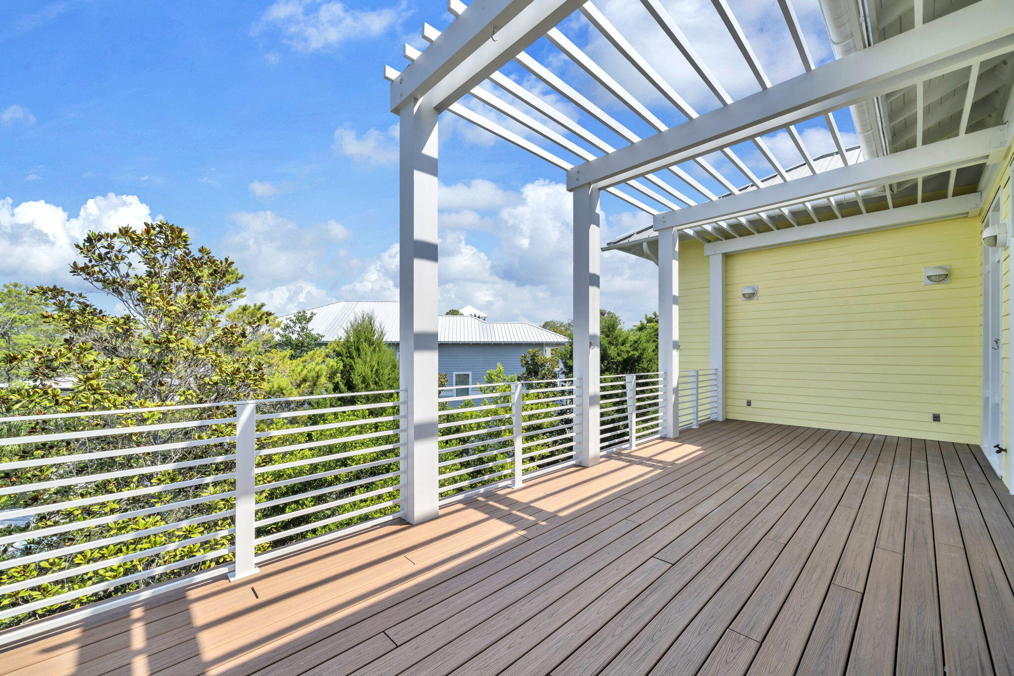 286 Forest Street Santa Rosa Beach, FL 32459 - Photo 25 of 68 a view of a balcony with wooden floor