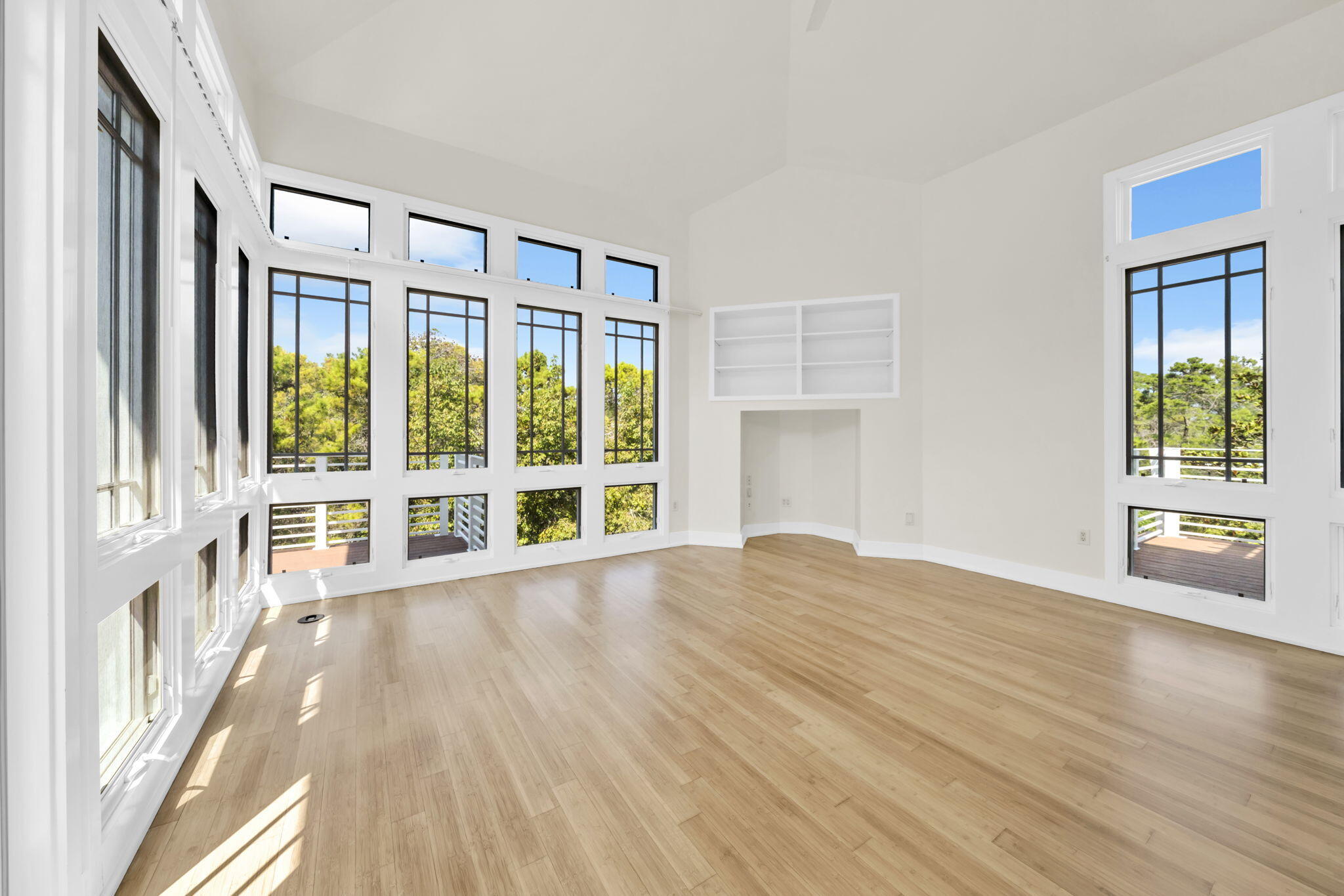 286 Forest Street Santa Rosa Beach, FL 32459 - Photo 27 of 68 a view of an empty room with wooden floor and a window