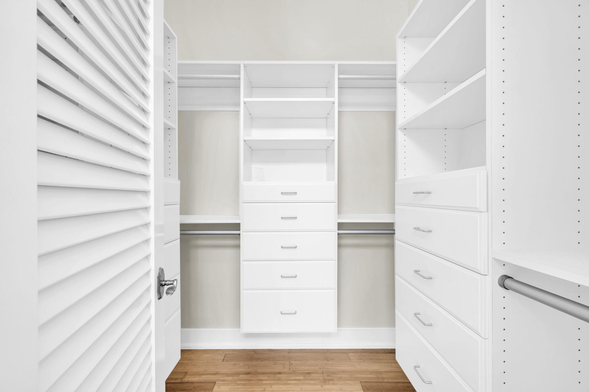 286 Forest Street Santa Rosa Beach, FL 32459 - Photo 34 of 68 a view of walk in closet with empty racks