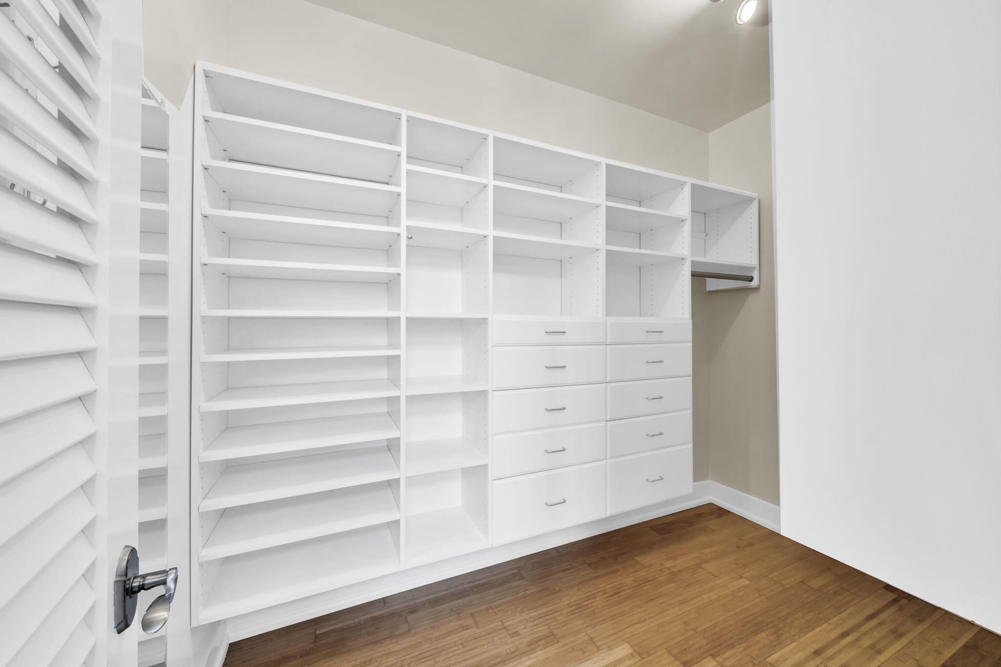286 Forest Street Santa Rosa Beach, FL 32459 - Photo 35 of 68 a view of an empty room with wooden floor and a window