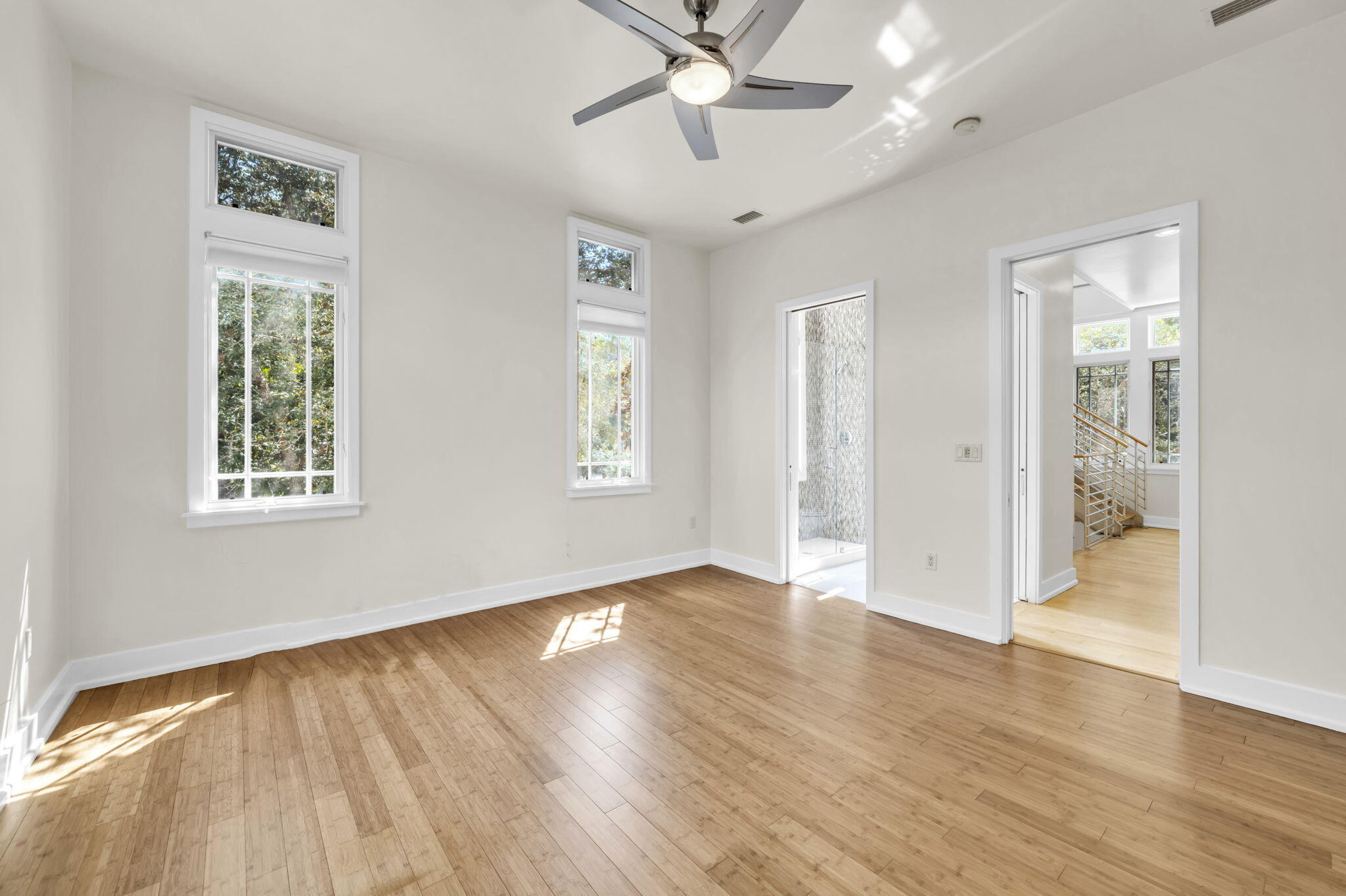 286 Forest Street Santa Rosa Beach, FL 32459 - Photo 41 of 68 wooden floor in an empty room with a window