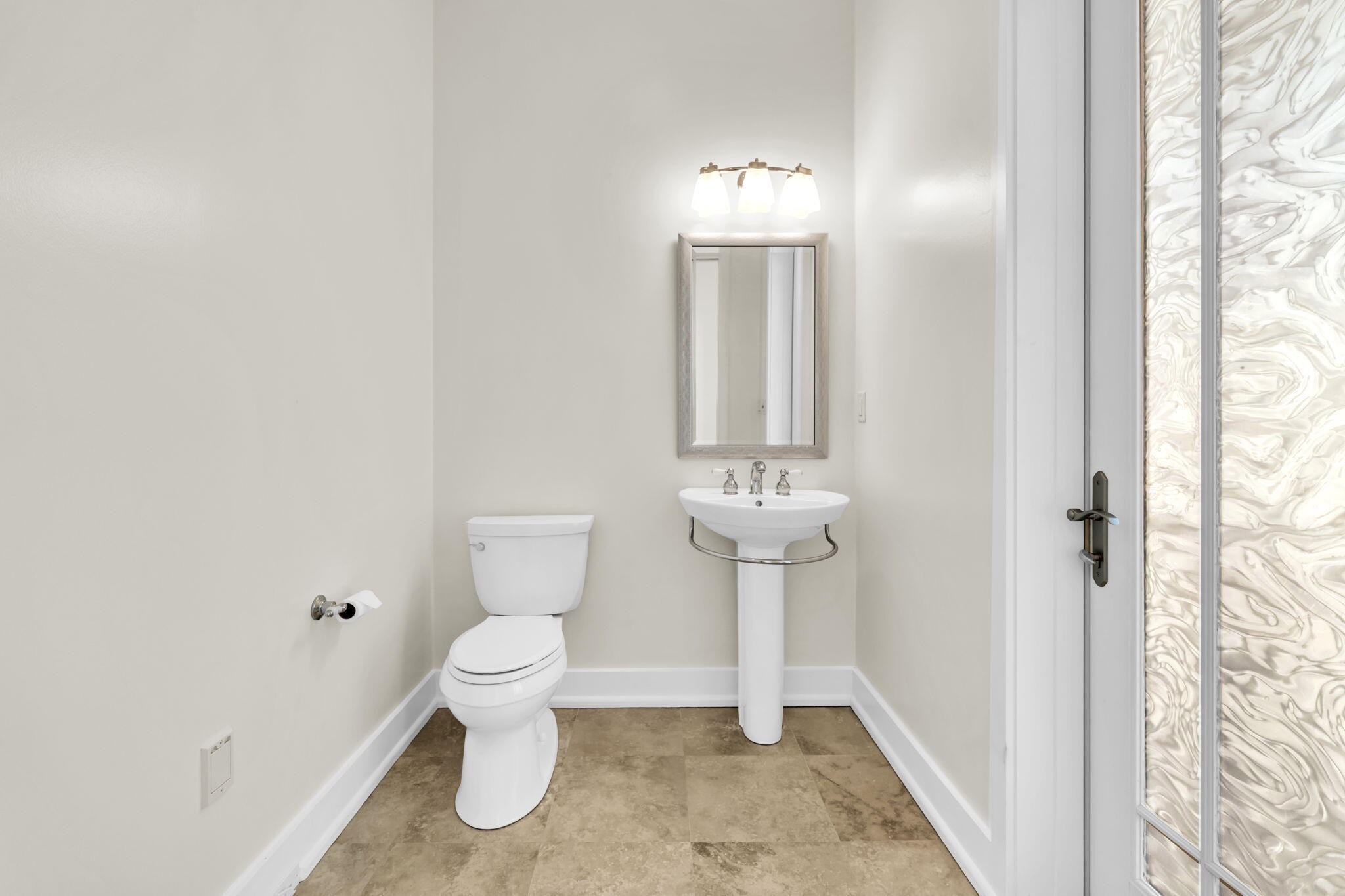 286 Forest Street Santa Rosa Beach, FL 32459 - Photo 47 of 68 a bathroom with a toilet sink and mirror