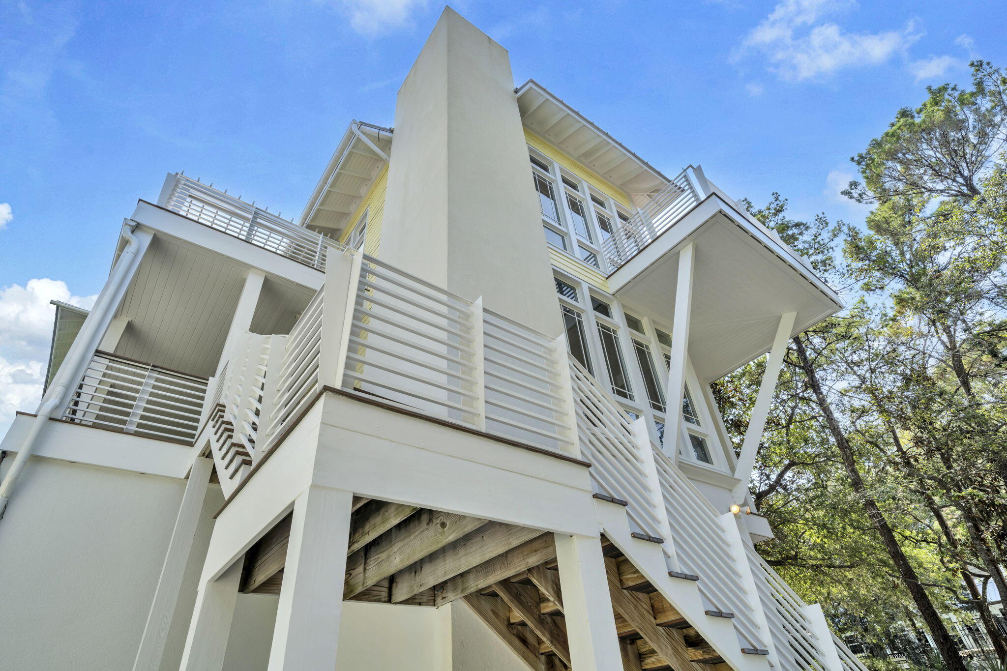 286 Forest Street Santa Rosa Beach, FL 32459 - Photo 7 of 68 a view of a house with a small space and wooden stairs