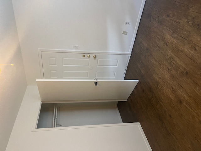 501 Hedgewood Drive, Unit D Georgetown, TX 78628 - Photo 9 of 15 Unfurnished bedroom featuring dark wood-style flooring and a closet