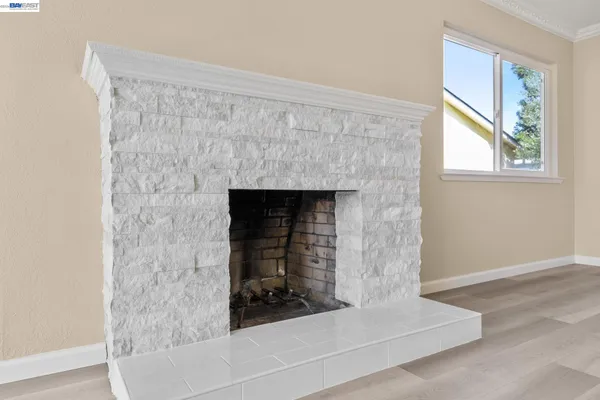 a living room with a fireplace