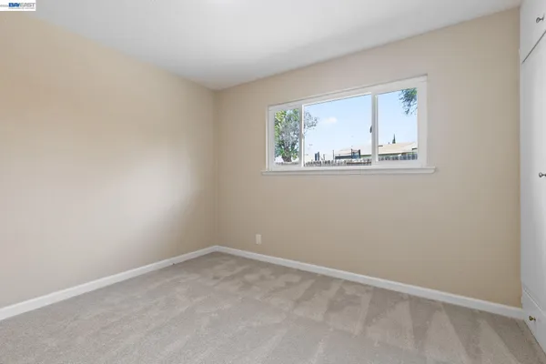 an empty room with window