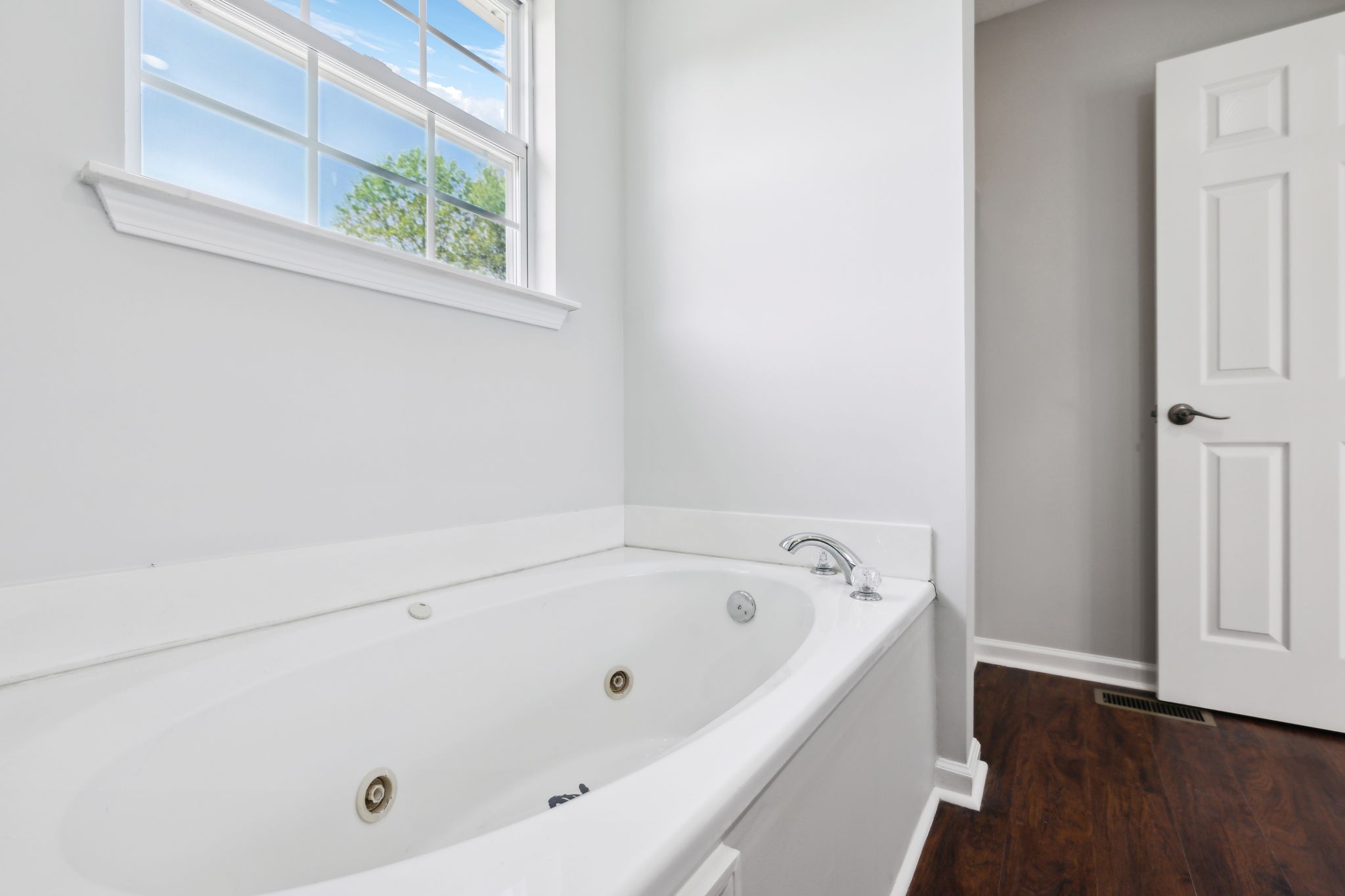 623 Audrey Road Mount Juliet, TN 37122 - Photo 14 of 27 a white bath tub sitting next to a window