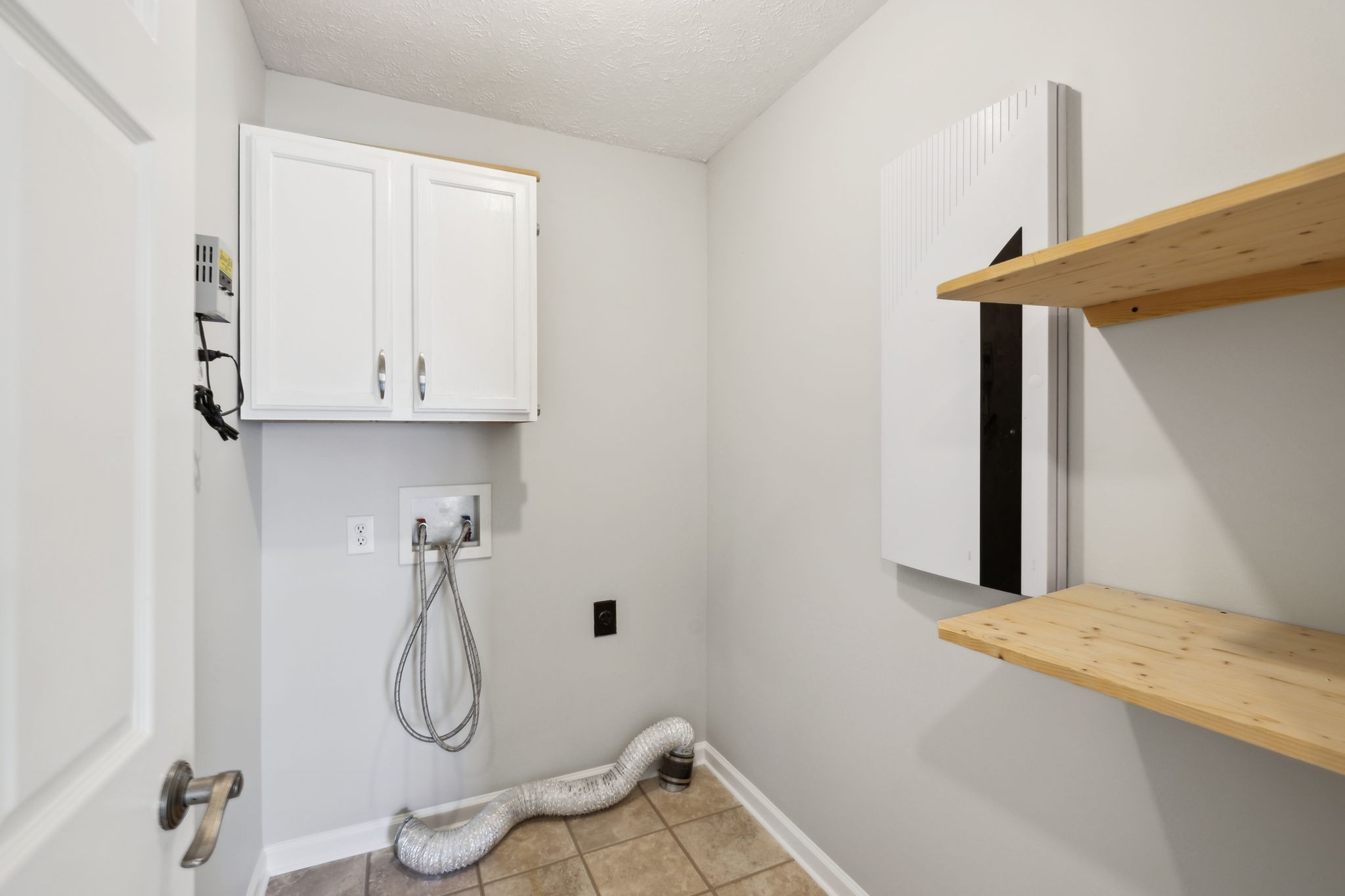 623 Audrey Road Mount Juliet, TN 37122 - Photo 20 of 27 a view of a room with rack on the wall