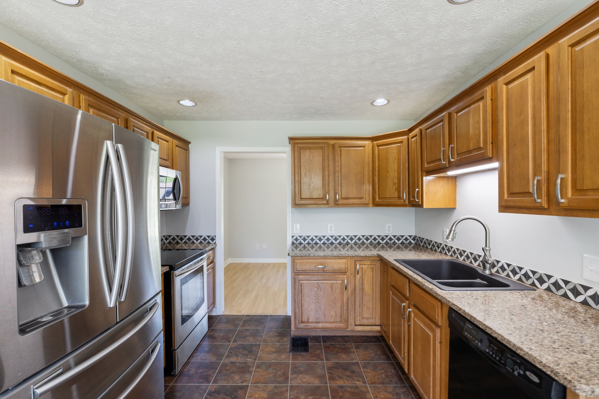 623 Audrey Road Mount Juliet, TN 37122 - Photo 9 of 27 a kitchen with a refrigerator sink and stove