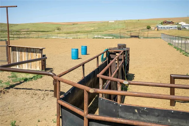 a view of a balcony with chairs