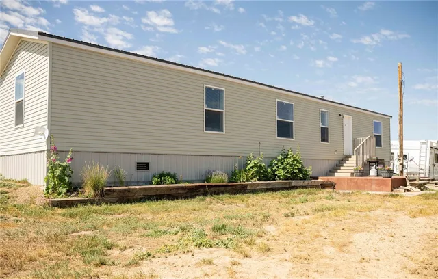 a view of an ocean beach and mountain