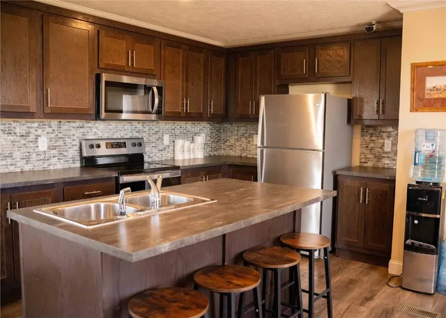 a close view of stove and microwave