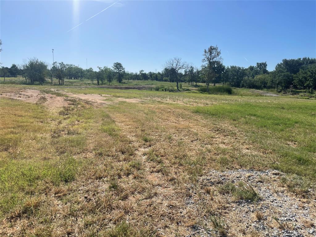 Tbd Lower Tonk Valley Road Graham, TX 76450 - Photo 2 of 15 a view of a lake with houses in the background