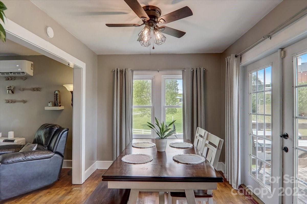 1393 Queentown Road Canton, NC 28716 - Photo 11 of 42 a view of a dining room with furniture window and outside view