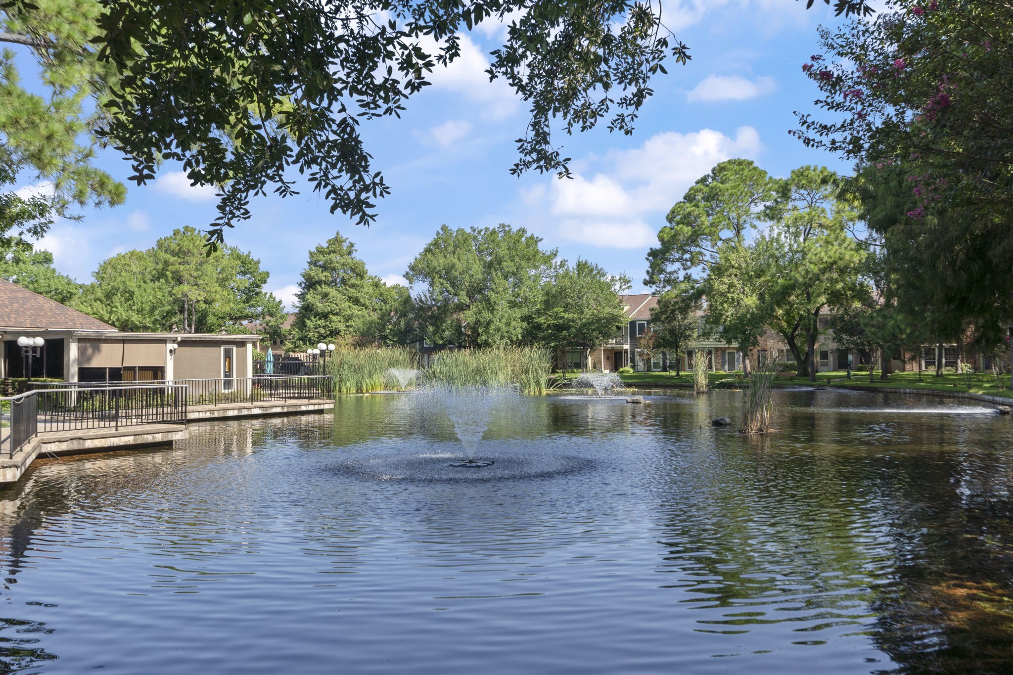 5801 Lumberdale Road, Unit 127 Houston, TX 77092 - Photo 19 of 26 a view of a lake with houses