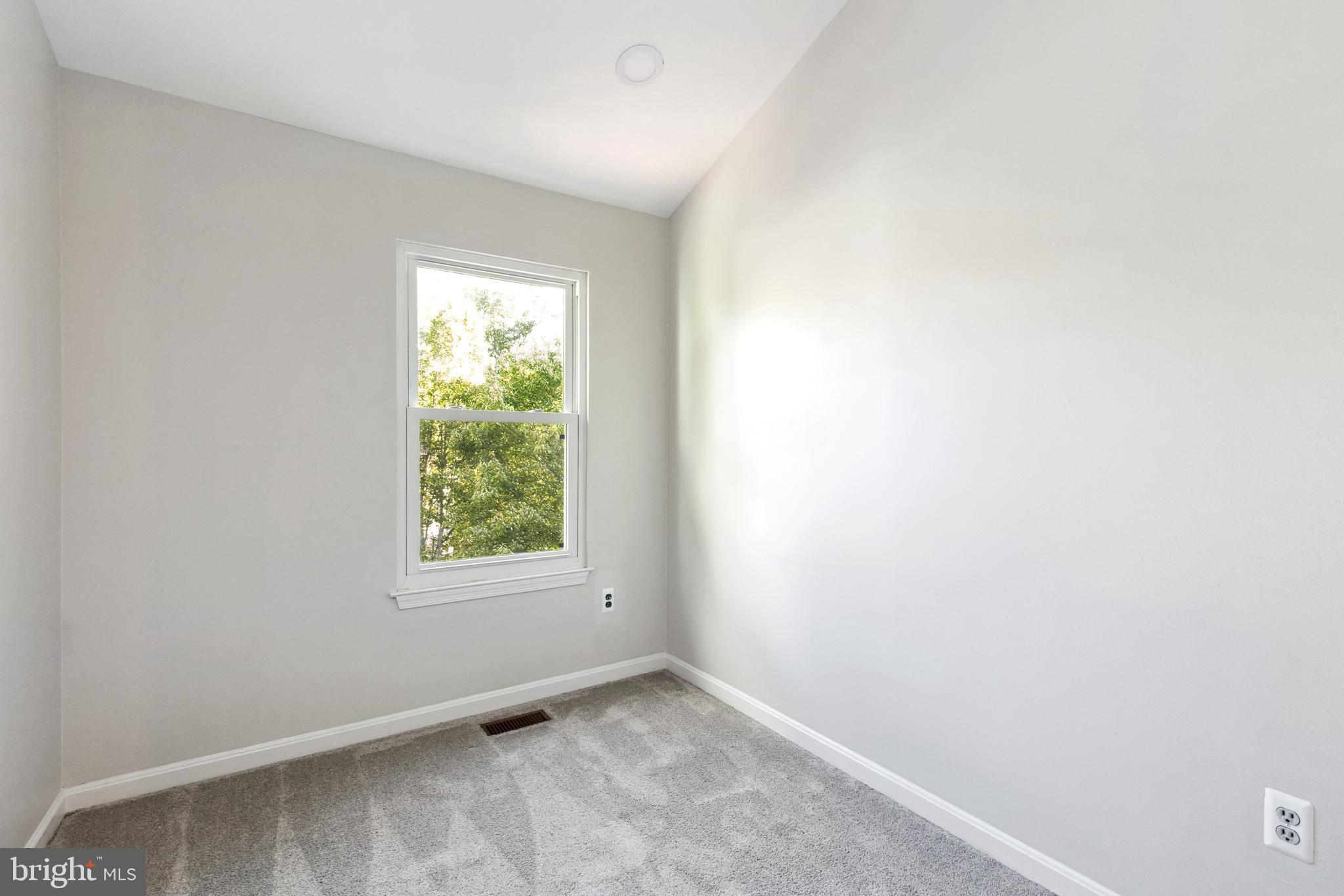 9525 Clocktower Lane Columbia, MD 21046 - Photo 12 of 19 a view of an empty room and window