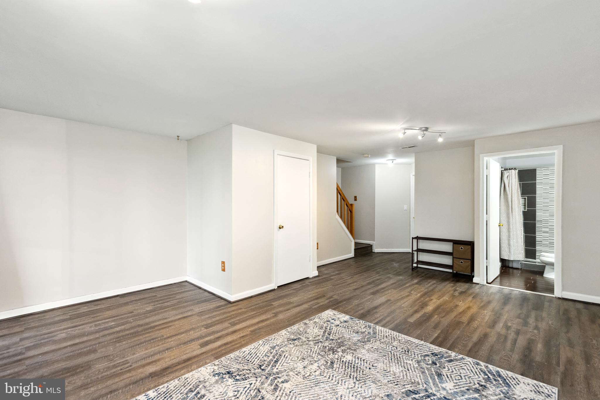 9525 Clocktower Lane Columbia, MD 21046 - Photo 15 of 19 a view of empty room with wooden floor