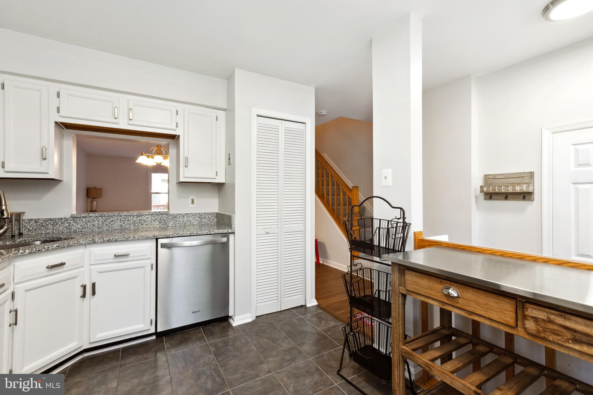 9525 Clocktower Lane Columbia, MD 21046 - Photo 6 of 19 a en suite bathroom with a granite countertop sink and a mirror