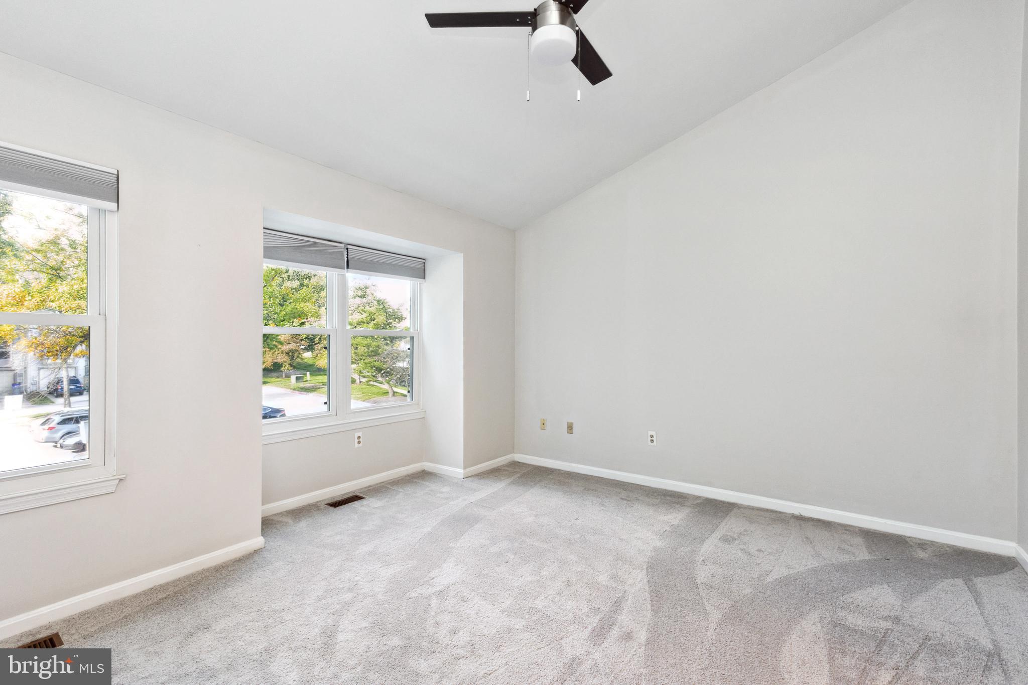 9525 Clocktower Lane Columbia, MD 21046 - Photo 9 of 19 an empty room with windows